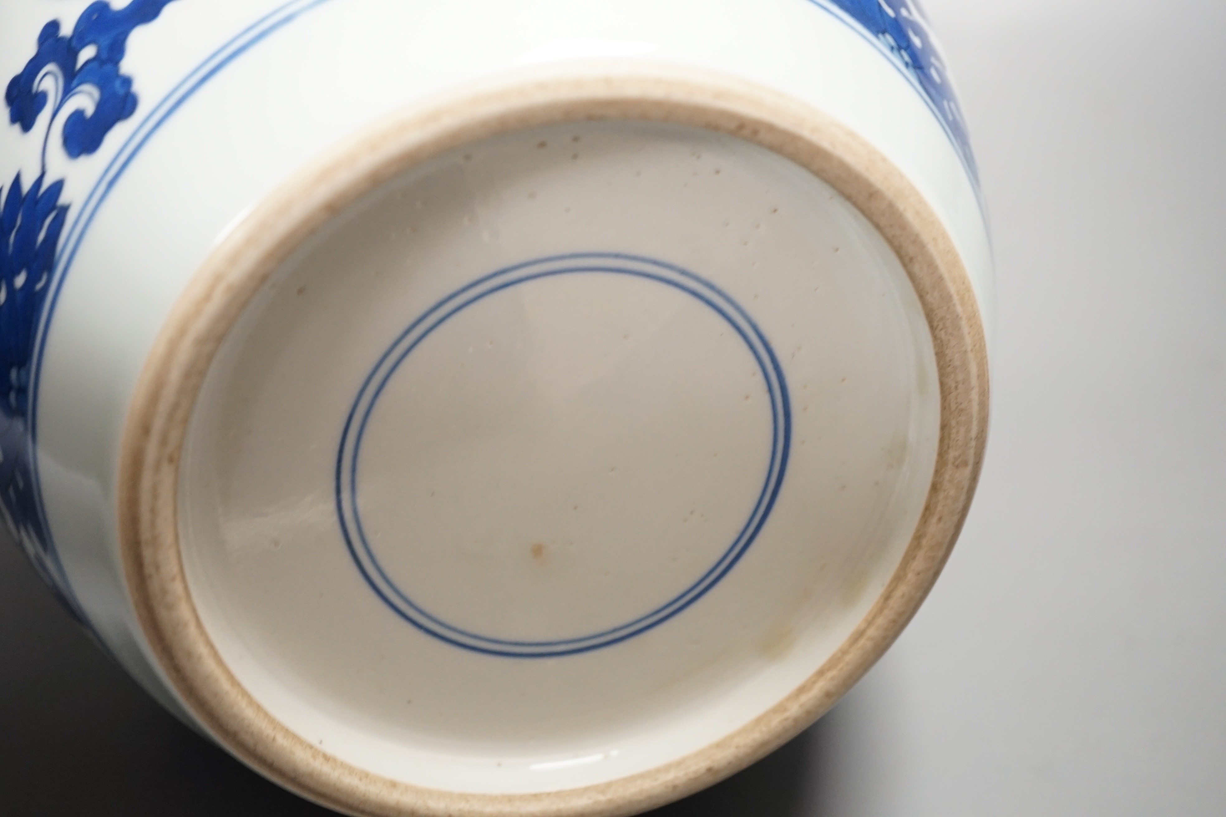 A Chinese blue and white jar, lacking cover 23cm